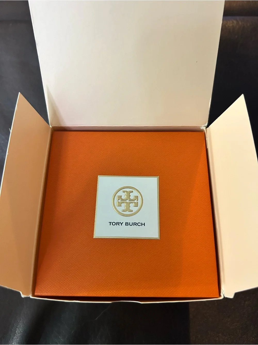 Tory Burch Gold-Tone Logo Dial Bangle Watch with White Face